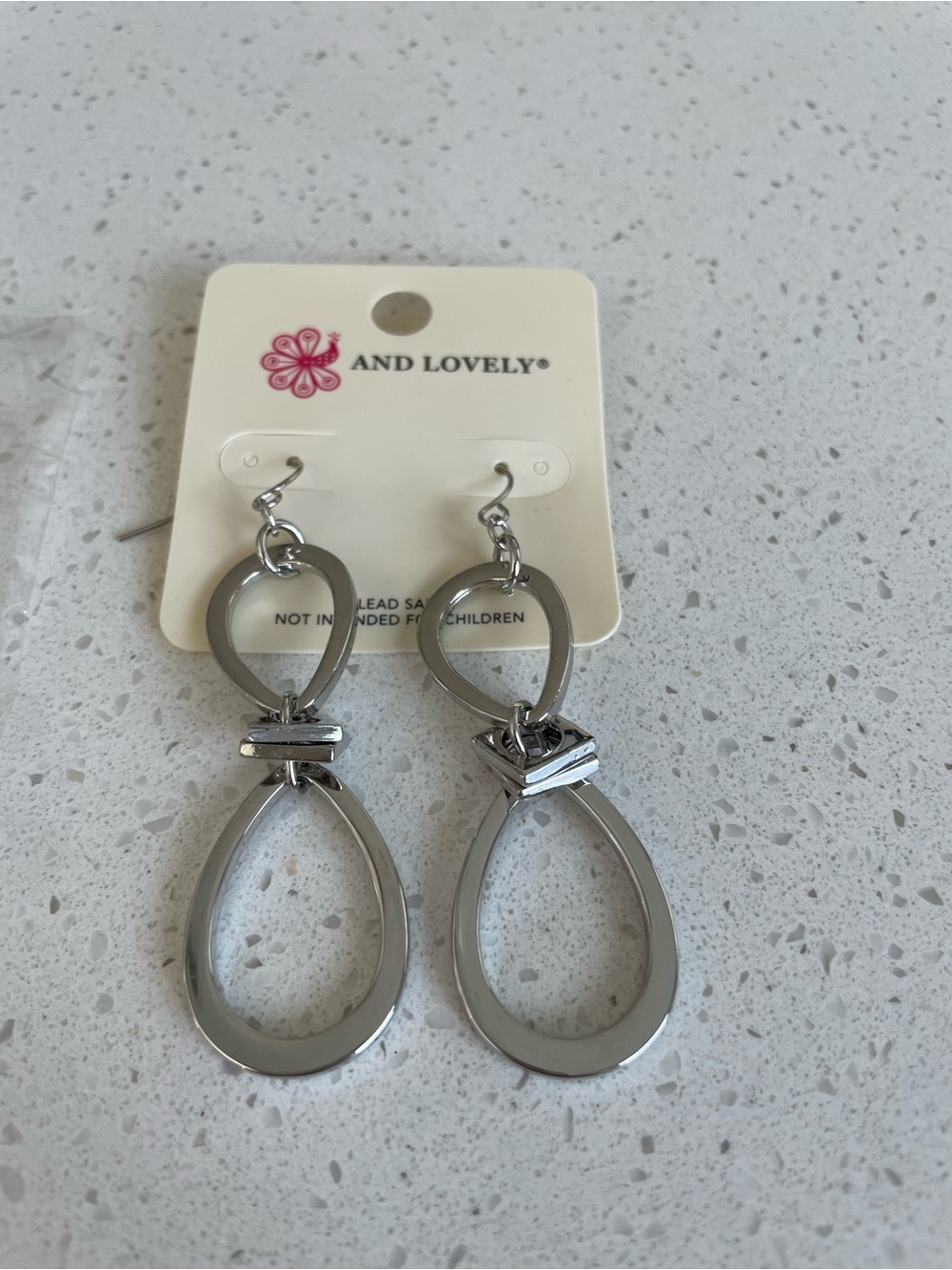 And Lovely Silver Tone Teardrop Dangle Earrings New with tags